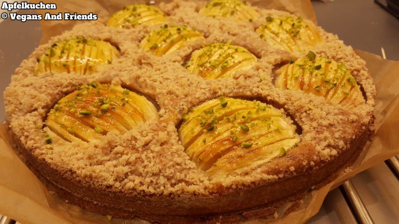 Apple pie ready decorated with small pieces of pistachio